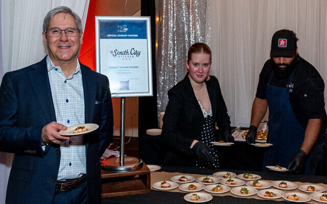 Stuart Fierman, of Fifth Group, offered salmon mousse, a family favorite. Stuart Fierman, of Fifth Group, offered salmon mousse, a family favorite.