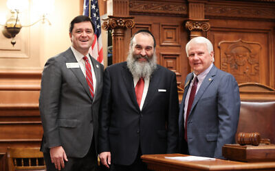 Rabbi Hirshy Minkowicz (center) drew upon the themes of Passover, freedom, and renewal in his invocation at the Georgia House of Representatives.