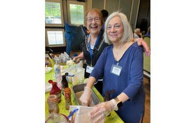 Joan Solomon, Hadassah Ketura Communications VP, enjoys scooping out ice cream for guests with Terry Nordin, President, Hadassah Greater Atlanta, at Berman Commons Hadassah Mitzvah Day.