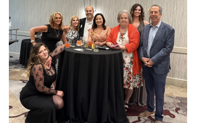 Members of the Siegel Insurance Team at the 60th anniversary celebration. (From left) Emily Leybovich, Shannon Katko, Sheila Bauer, Sheldon Berch, Kristi Kissel, Anya Leybovich, Tammie Weathers, and Andy Siegel..