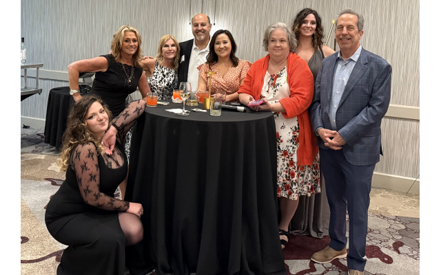 Members of the Siegel Insurance Team at the 60th anniversary celebration. (From left) Emily Leybovich, Shannon Katko, Sheila Bauer, Sheldon Berch, Kristi Kissel, Anya Leybovich, Tammie Weathers, and Andy Siegel..
