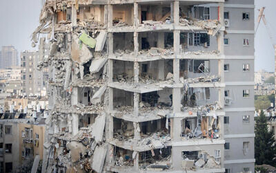 The scene of an apartment building destroyed by an Iranian ballistic missile impact, in Bat Yam, June 15, 2025 // Photo Credit: Chaim Goldberg/Flash90/Times of Israel