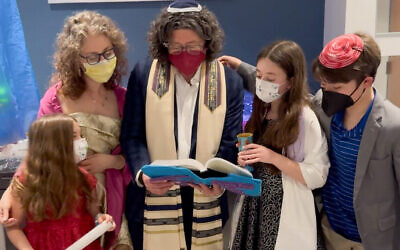 Rabbi Larry Sernovitz (center) conducted a second Bat Mitzvah service in the hospital // All photos by Glenn Prince