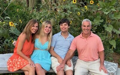 The Dunay family, (from left) Lizette, Emma, Alex, and Dave, visit the Botanical Garden. 