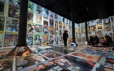 Approximately 1,300 Rolling Stone magazine covers dazzle the audience.