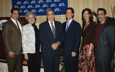 Miles Alexander, with his wife, Elaine, and their four children, (from left) Michael, Kent, Paige, and David.