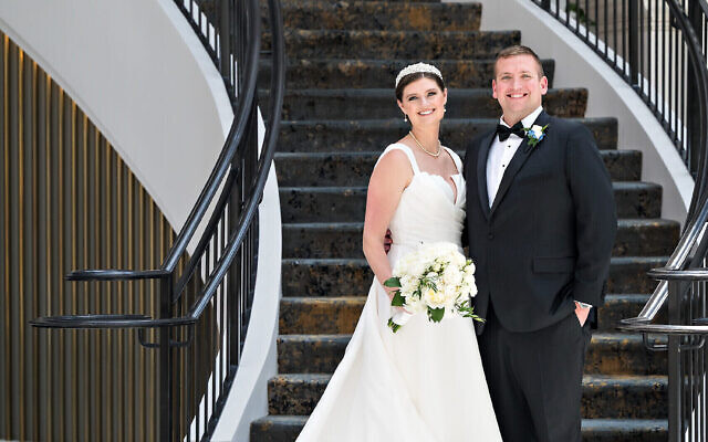 Lydia’s dress was designed by Anne Barge.