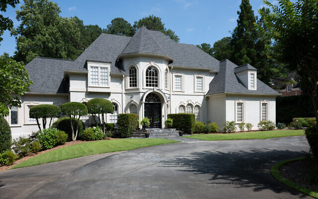 The stucco home was renovated three years ago. Alan had the backyard modeled after a European patio. 