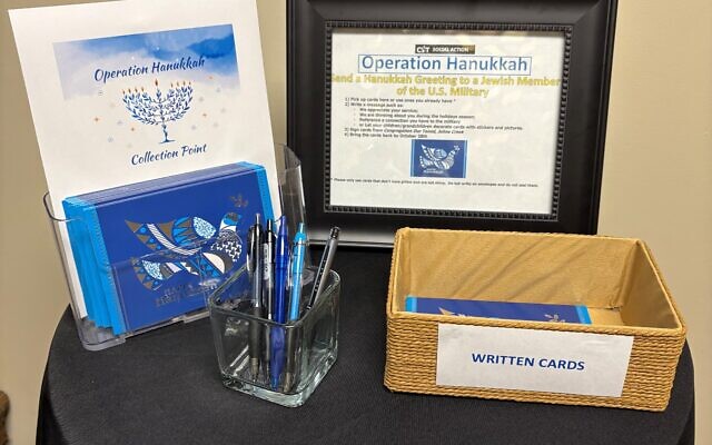 A table for at Congregation Dor Tamid for writing Chanukah cards to soldiers, set up by their Social Action Committee. A table for at Congregation Dor Tamid for writing Chanukah cards to soldiers, set up by their Social Action Committee.