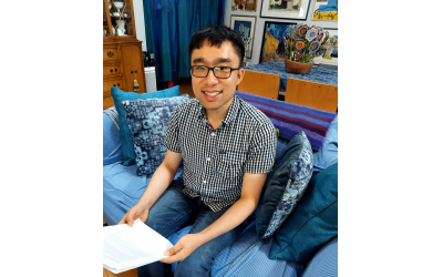 Peter Tran pictured with his Yiddish poetry. Peter Tran pictured with his Yiddish poetry.