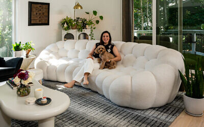 Nadia relaxes with Shiloh on a chenille textured couch from Roche Bobois // All photos by Howard Mendel