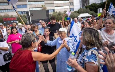 People celebrate at Hostage Square in Tel Aviv, as negotiators sign a hostage-ceasefire deal // Photo Credit: Chaim Goldberg/FLASH90/Times of Israel