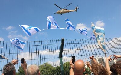 An Israeli military helicopter prepares to land as it transport a released Israeli hostage to the Beilinson Hospital in the Rabin Medical Centre in Petah Tikva in central Israel on Oct. 13, 2025 // Photo Credit: GIL COHEN-MAGEN/AFP/Times of Israel // Video credit: Itay Beit-On (GPO) / Sound credit: Yehzkel Kandil (GPO)