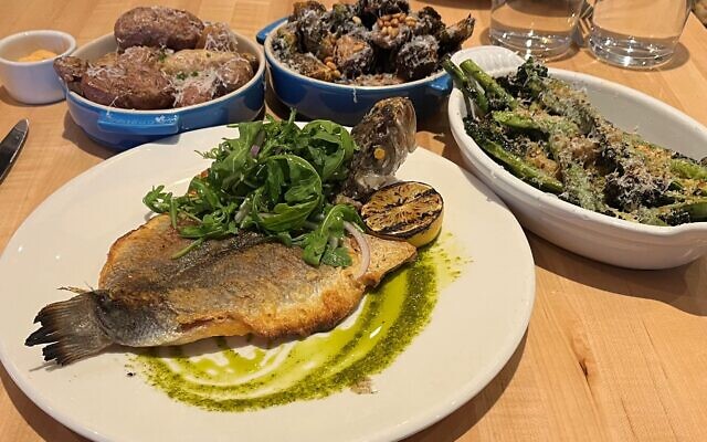 Crispy potatoes, Branzino, Brussels sprouts, and charred broccolini made for a hearty meal.   