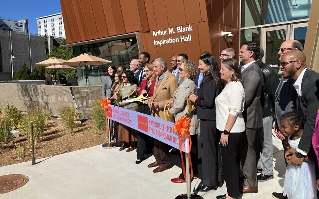 Arthur Blank cuts the ribbon on a new wing bearing his name at the National Center for Civil and Human Rights. Arthur Blank cuts the ribbon on a new wing bearing his name at the National Center for Civil and Human Rights.