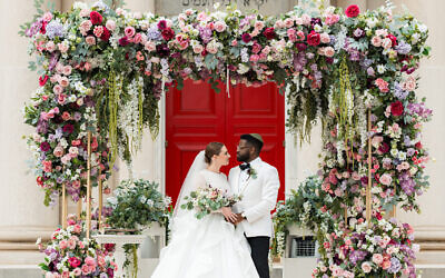 The front steps of The Temple and chuppah were arranged by Jim White Designs // All photos by Shalom Surgo