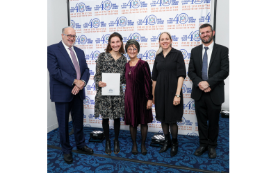 Dr. Rebecca Winter receives her IHSP certificate. Pictured, from left: Rabbi Dr. Kenneth Brander, Dr. Rebecca Winter, Rabbanit Dr. Hannah Haskes, Rabbanit Chamutal Shoval, and Rabbi David Brofsky.