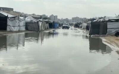 Flash flooding along highways and roads in central Israel trapped dozens of drivers in their vehicles.