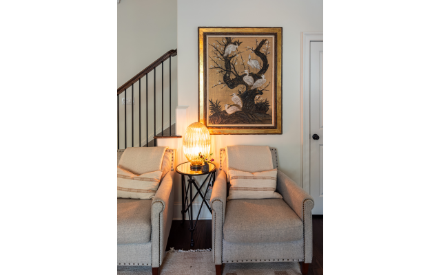 Liz’s circa-1910 chinoiserie egrets are backed in gold within their original water-gilded frame.   