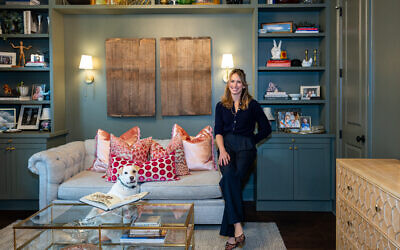 Rosenzweig relaxes with dog, Bohdi, in her study which transitions into a guest bedroom // All photos by Howard Mendel