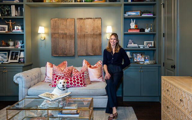 Rosenzweig relaxes with dog, Bohdi, in her study which transitions into a guest bedroom // All photos by Howard Mendel