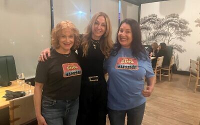 Lisa Reich (left) and Hildee Isaacs flank Reunion owner Ilene Kapper Oxman.