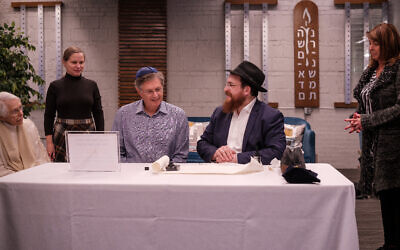 Bernie’s son, Michael Morris, pictured here wearing a blue kippah, values the sentiment in creating a communal legacy for his father.