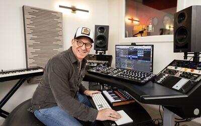 Eric Breiner in the control room with a client in the vocal booth // All photos courtesy of Elle Wood Photography