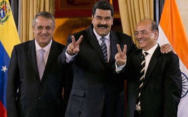Venezuelan President Nicholas Maduro in happier days with executives of the country’s national oil company.