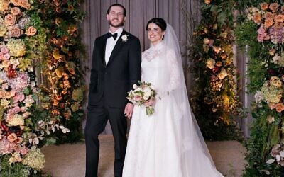 Stephanie and Scott pictured under the chuppah.  //  All photos by Laura Stone