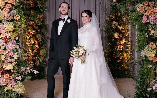 Stephanie and Scott pictured under the chuppah. // All photos by Laura Stone Stephanie and Scott pictured under the chuppah. // All photos by Laura Stone
