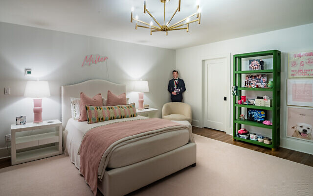 Daughter, Miller, a student at Tulane University, chose blush pink with Laura Park custom drapes and decorative pillows. Her room reflects her interests, including Taylor Swift, tennis, and Legos. 