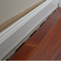 Baseboard movement due to moisture intrusion