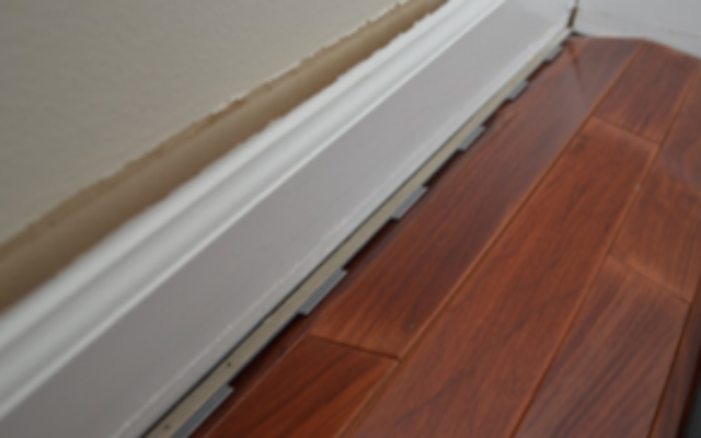 Baseboard movement due to moisture intrusion Baseboard movement due to moisture intrusion