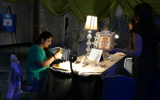 The henna station is always a popular spot. The henna station is always a popular spot.