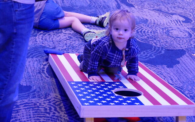 This little one found a new way to enjoy the cornhole game. This little one found a new way to enjoy the cornhole game.