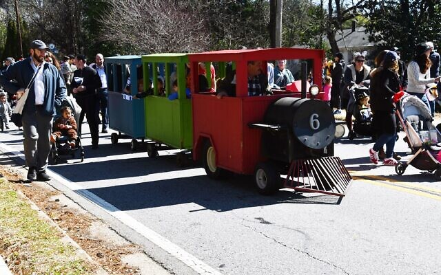 Members of the Beth Jacob preschool community are pictured during the parade.