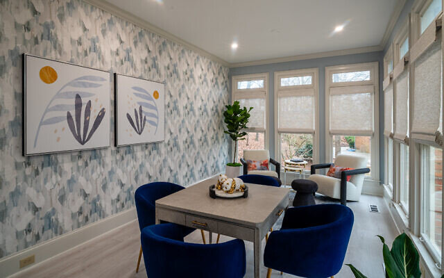Sheryl makes good use of the redesigned game room with natural light.