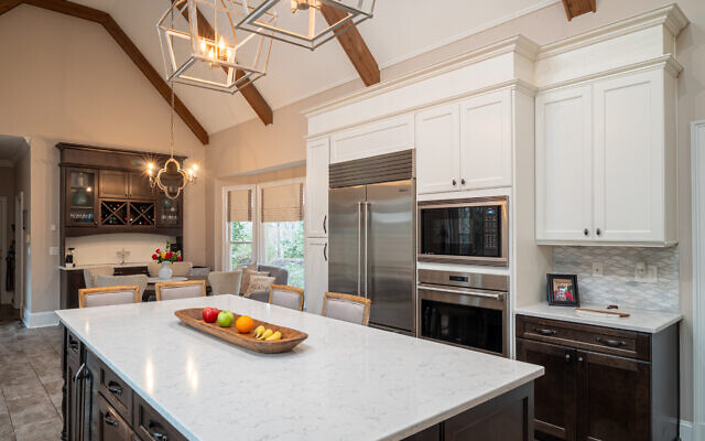 The kitchen was renovated prior to Zimmerman’s work and designed to flow into the dining room. 