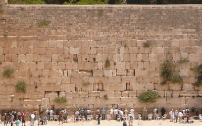 Volunteers took to the Western Wall in Jerusalem’s Old City to remove hundreds of thousands of the small prayer notes.