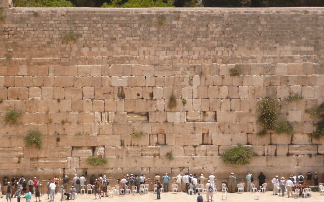 Volunteers took to the Western Wall in Jerusalem’s Old City to remove hundreds of thousands of the small prayer notes. Volunteers took to the Western Wall in Jerusalem’s Old City to remove hundreds of thousands of the small prayer notes.