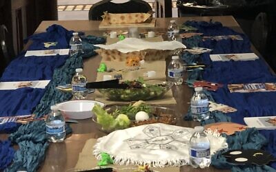 The seder table inside the state capitol