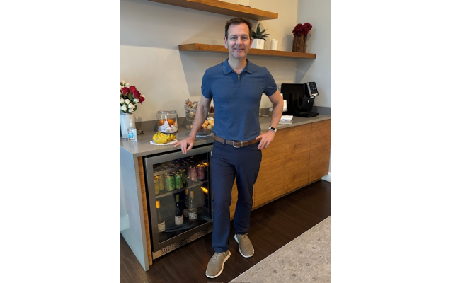Spencer Rosen, owner of The Art of Touch, pictured at one of the studio’s hospitality areas.