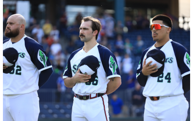 Rowdy Tellez (left) standing alongside rehabbing Braves ace Spencer Strider and infielder Nacho Alvarez during the national anthem of a recent Gwinnett Stripers game. The Jewish veteran first baseman/DH is hoping to join Strider in Atlanta at some point this summer // Photo Credit: Gwinnett Stripers 