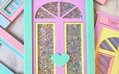 One of Atlanta artist Karen Anderson Singer’s tiny doors created for the Green Heart art project for Arthritis Awareness Month