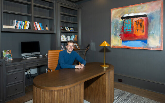 A contemporary painting from Aspen is behind Dr. Polacheck’s desk.    