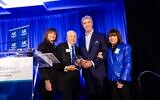 Ted Blum received the American Jewish Committee award from Linda Selig, Steve Selig, and Cathy Selig Kuranoff // All photos by Jacob Ross