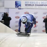 On his skeleton rides, Firestone dives headfirst down an icy track on a small sled, reaching speeds of up to 90 miles per hour // Photo Credit: Ken Childs 