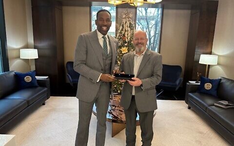 Guy Tessler pictured with Mayor Andre Dickens