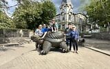 The family posed at the Turtle statue at Jurmala, known for its healing and spa culture.